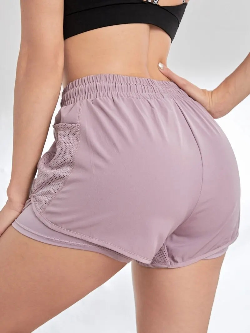 Shorts esportivos elástico com bolsos